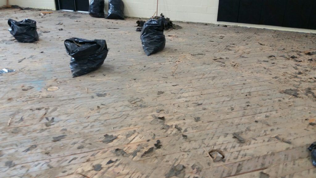 torn up basketball floor